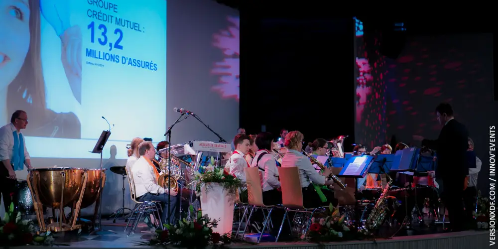 Concert live organisé pendant une convention entreprise à Saint-Étienne, en partenariat avec le Crédit Mutuel