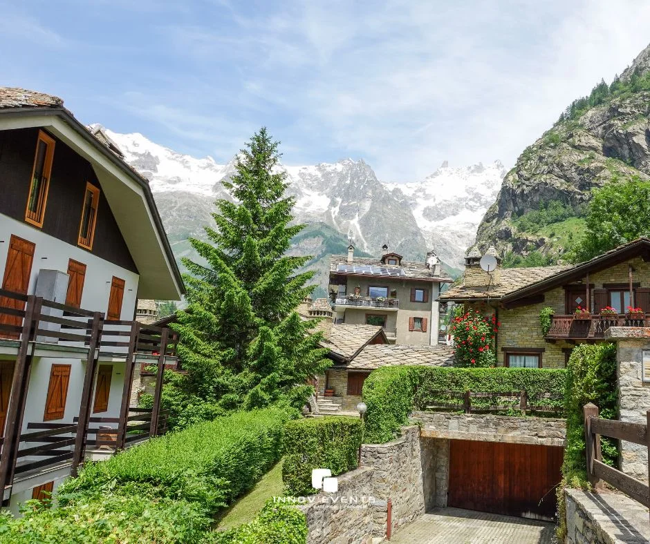 Animation séminaire Annecy groupe en activité sur les rives du lac avec les Alpes en arrière-plan — INNOV'events organisation événements